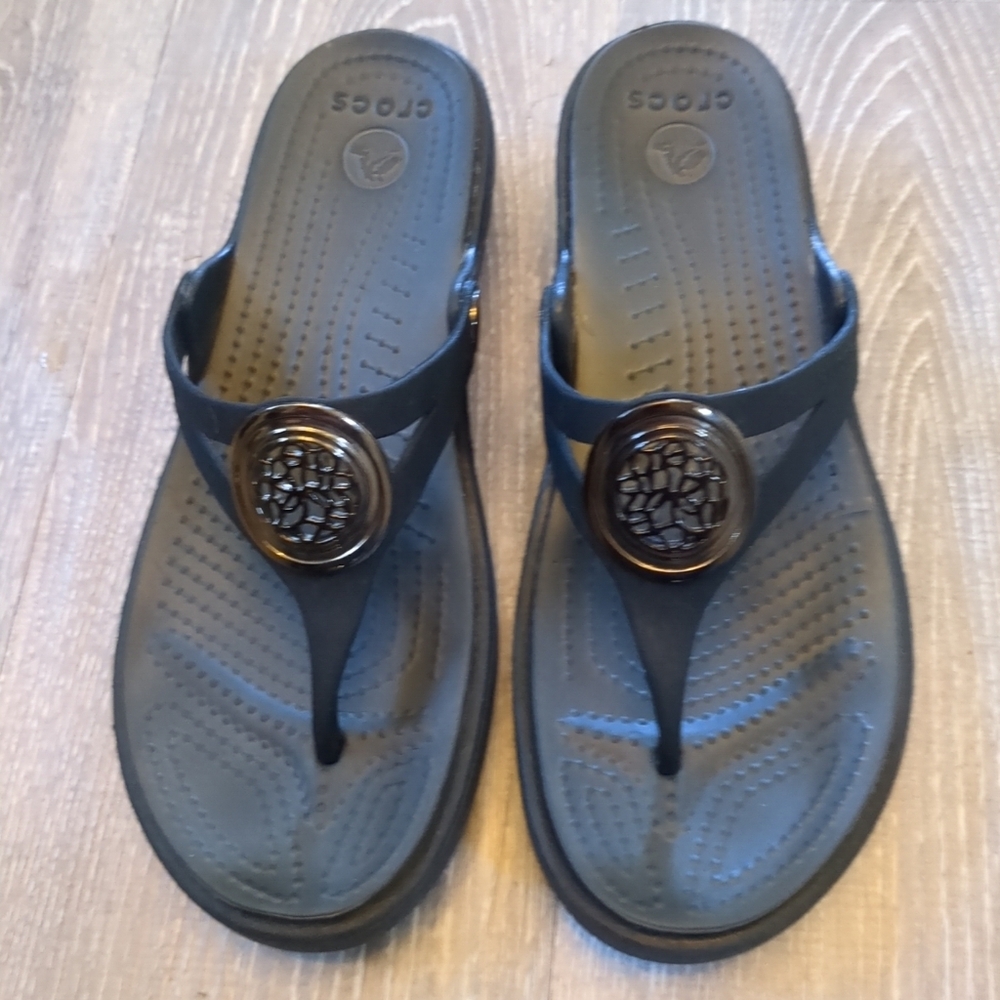 CROCS Black Thong Sandals with Decorative Medallion